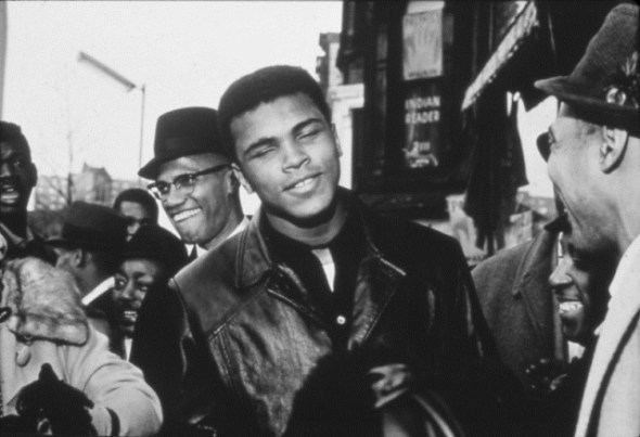 ZP_Muhammad Ali with Malcolm X in the background_1964 photograph by Robert L. Haggins