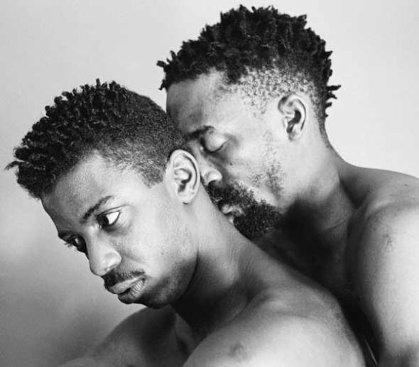 ZP_portrait by Rotimi Fani Kayode_Dennis Carney and Essex Hemphill in Brixton, London, 1988.  Hemphill is holding Carney and kissing the back of his neck.