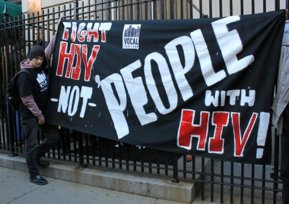 Fight HIV not People with HIV! Activist with banner outside the Russian Embassy in New York City_2013