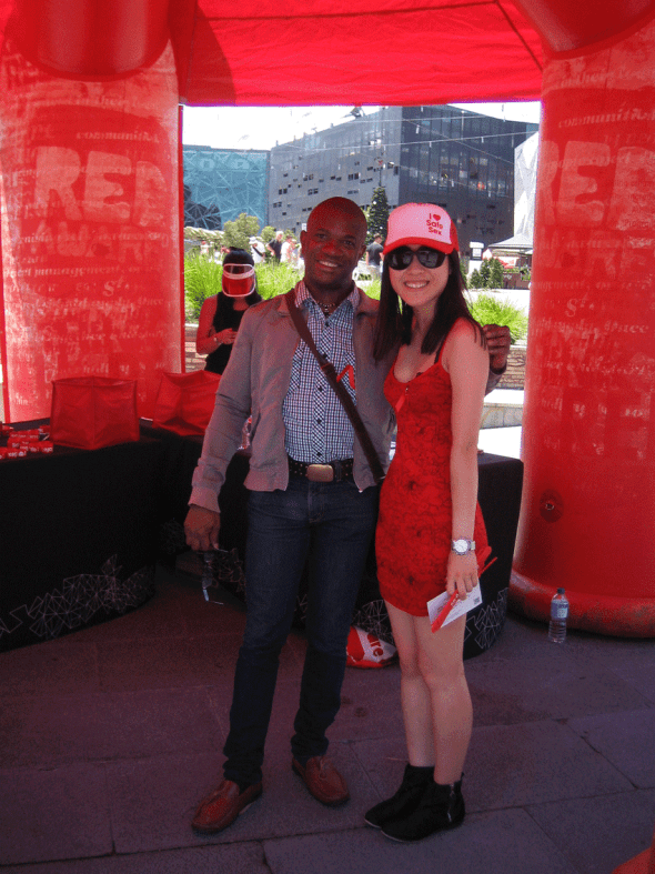 Melbourne Australia_Federation Square Red Aware dot org Info Tent for World AIDS Day 2014_Dr. Clovis Palmer with a volunteer