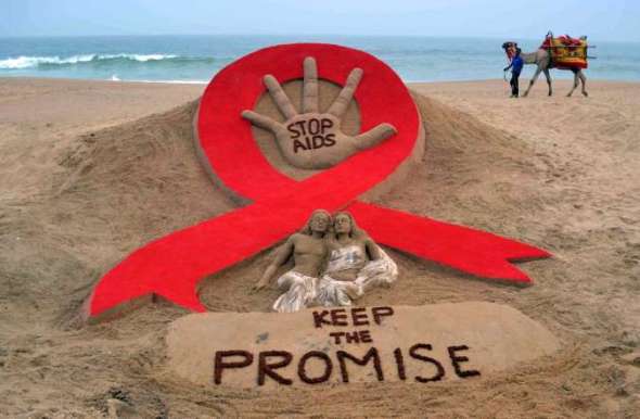 World AIDS Day 2013_sand sculpture by Sudarshan Patnaik at a beach in Puri_Odisha_India