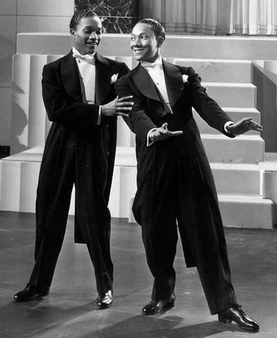 Fayard and Howard_The Nicholas Brothers_seen in a still from the motion picture Stormy Weather 1943