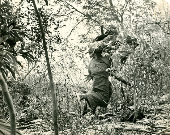A revolutionary soldier caught on camera by chance as he was struck by the bullet that killed him_Tirso Martinez_Cuba, 1958